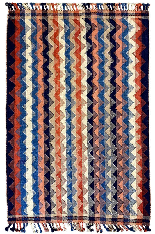 Rug with a blue, red, and beige zigzag pattern, with fringes, 219x141 cm