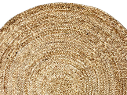 Close-up: 120x120 cm jute rug with a fine weave and spiral lines