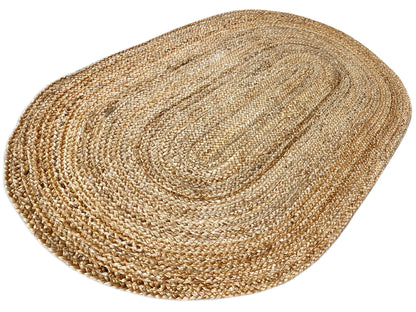 Oval jute rug, flat-woven natural fibers with round, integrated lines.