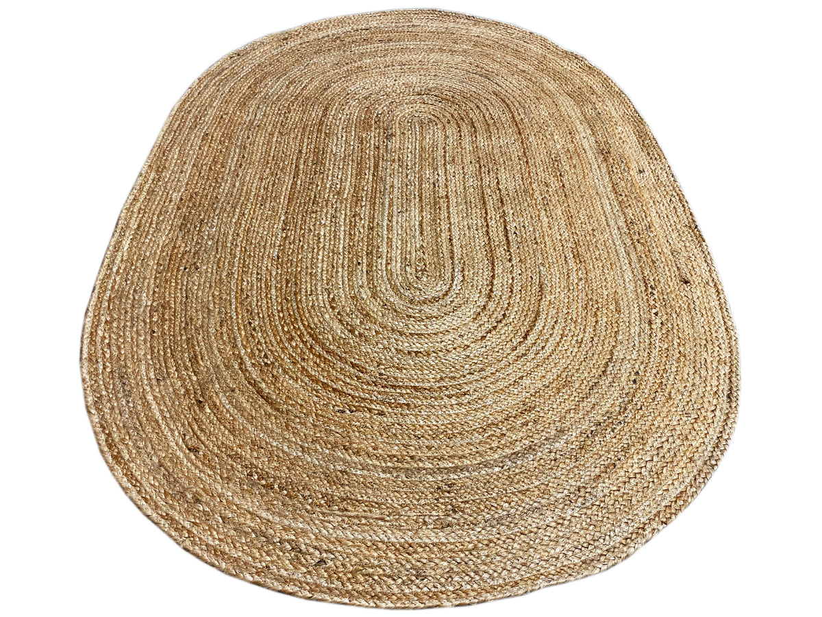Oval jute rug in natural beige, spiral pattern, coarsely woven surface
