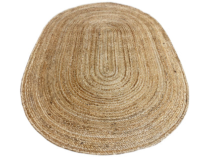 Oval jute rug in natural beige, spiral pattern, coarsely woven surface
