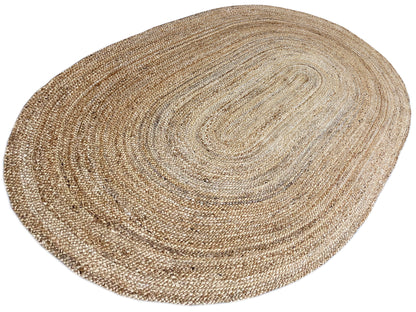 Oval jute rug with a dense woven pattern and spiral design