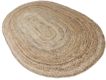 Oval jute rug, light natural fiber with a spiraling pattern