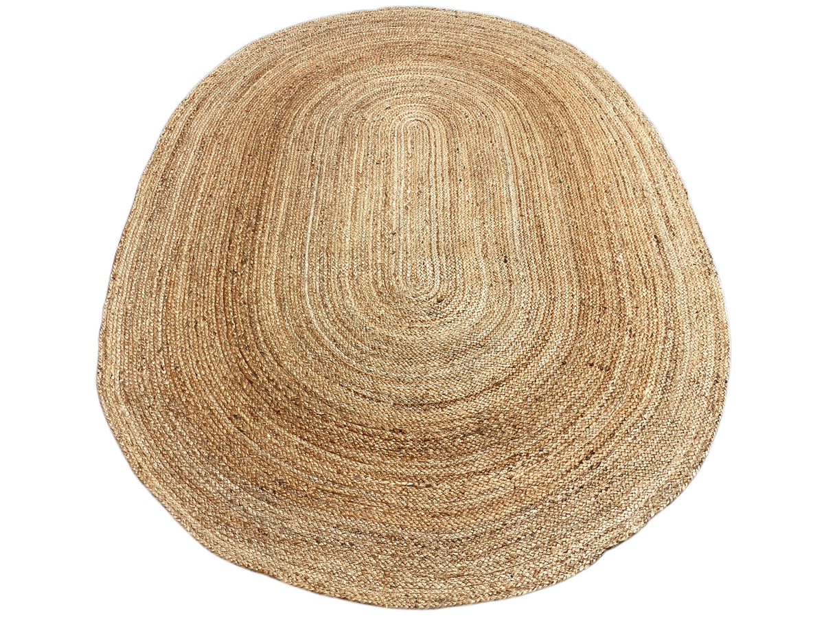Jute rug with a spiral braid pattern in natural and gold tones