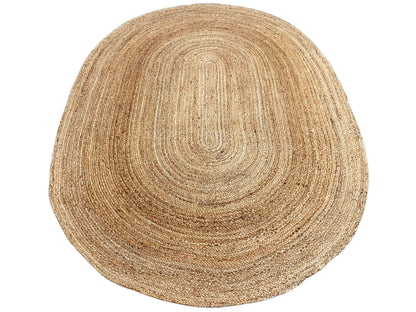Jute rug with a spiral braid pattern in natural and gold tones