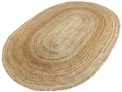 Oval jute rug, spiral braid pattern with a fine, dense texture