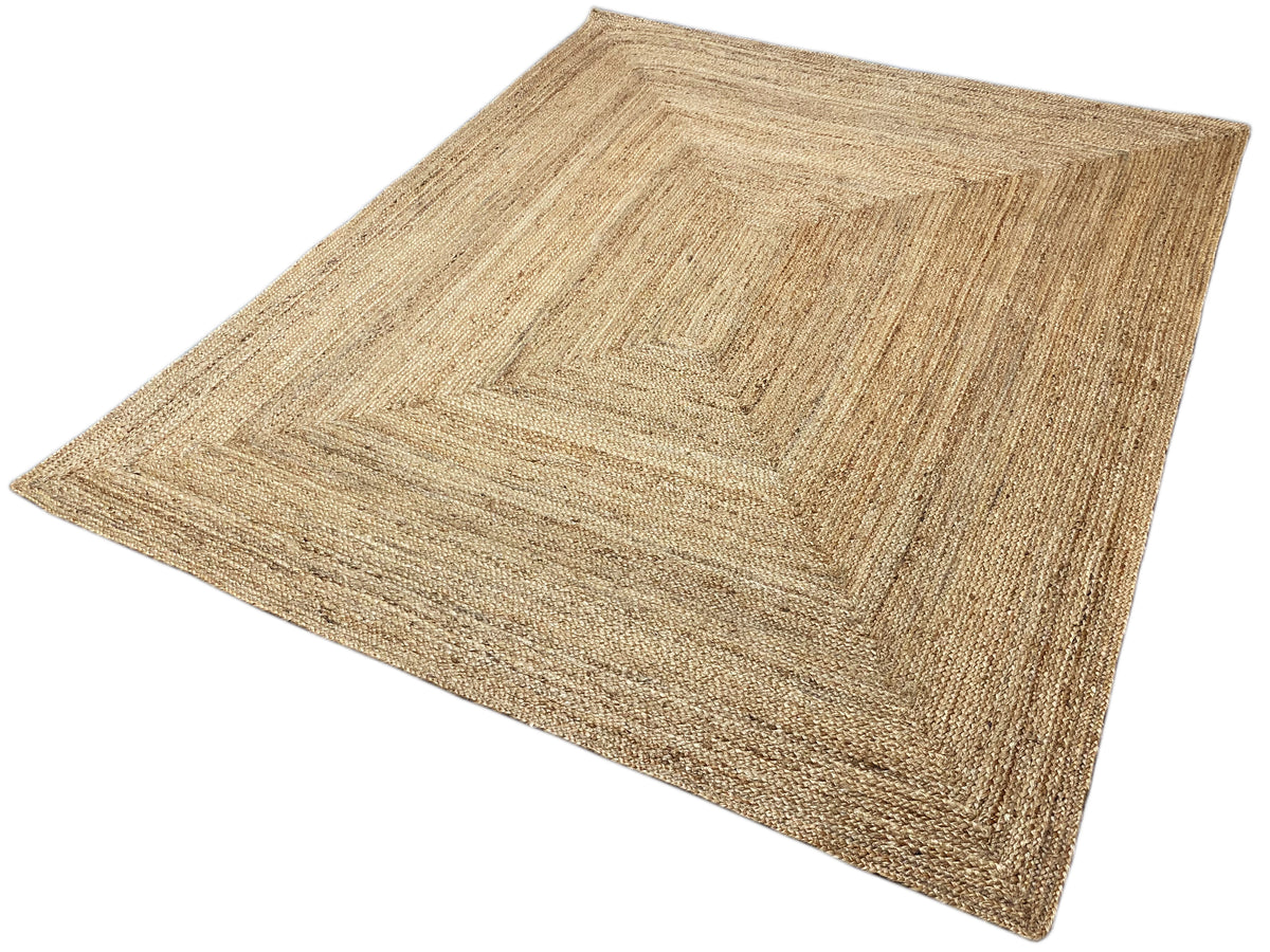 Rectangular jute rug with a geometric square pattern in natural beige, flat-woven.