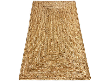Rectangular jute rug with a visible edge, natural brown woven pattern, flat