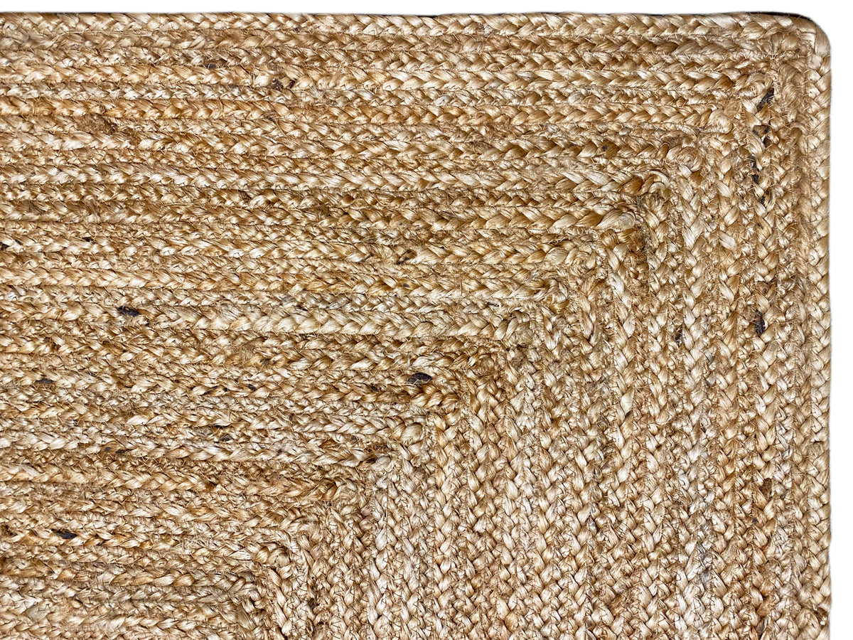 Jute rug - detail of the selvedge and fiber texture in beige, 60x110 cm