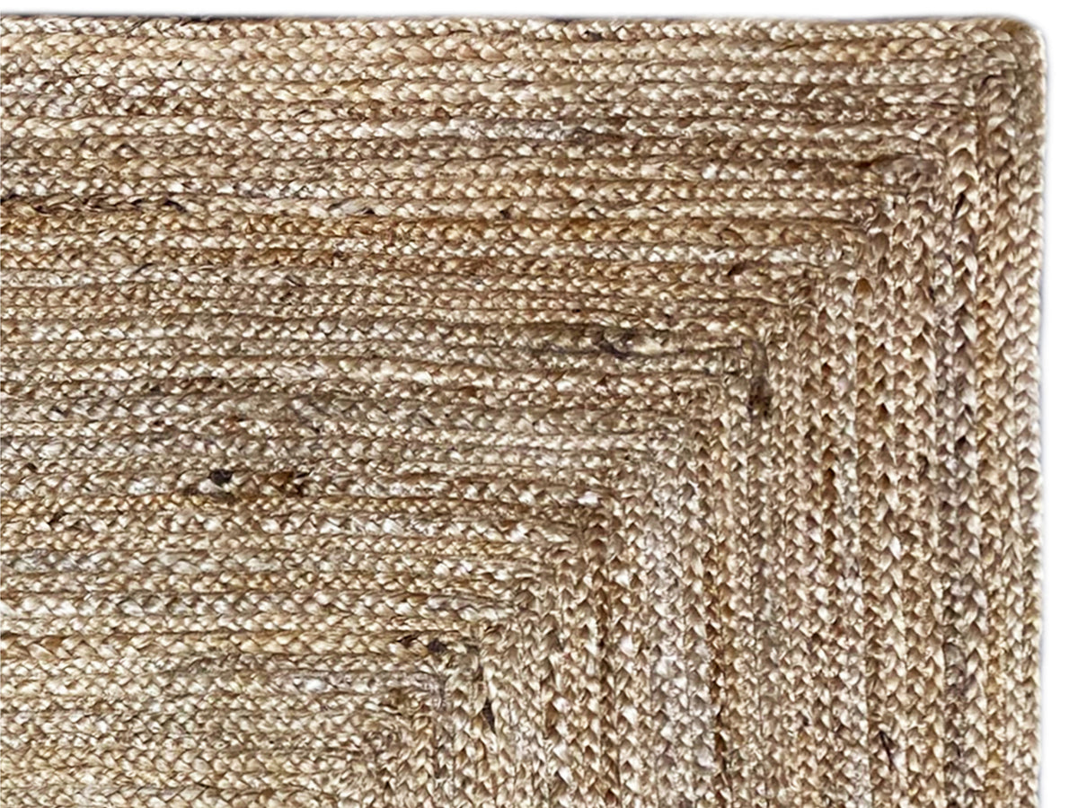 Jute rug, close-up: beige jute texture with a fine woven pattern