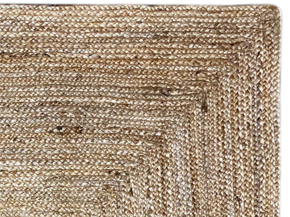 Jute rug, close-up: beige jute texture with a fine woven pattern
