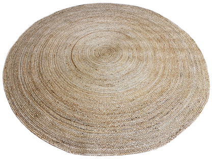 Round natural jute rug with a flat, spiral-woven pattern