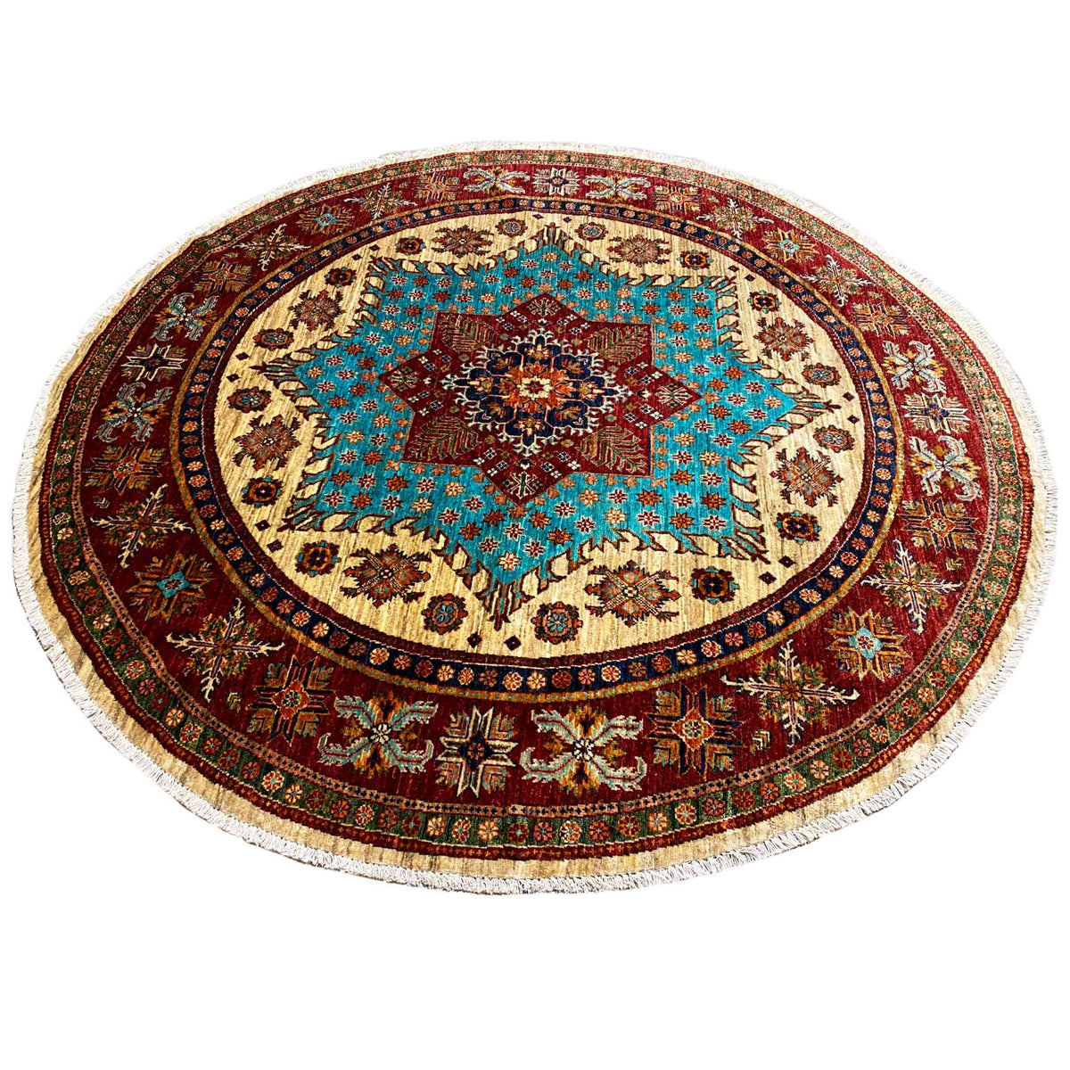 Round rug with a turquoise central medallion, beige areas, and a red border trim