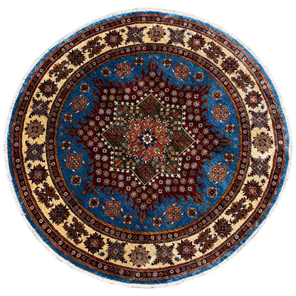 Round rug with a blue medallion and ornamental floral pattern, multicolored border