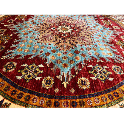 Close-up: Round rug with red, blue, and beige ornaments