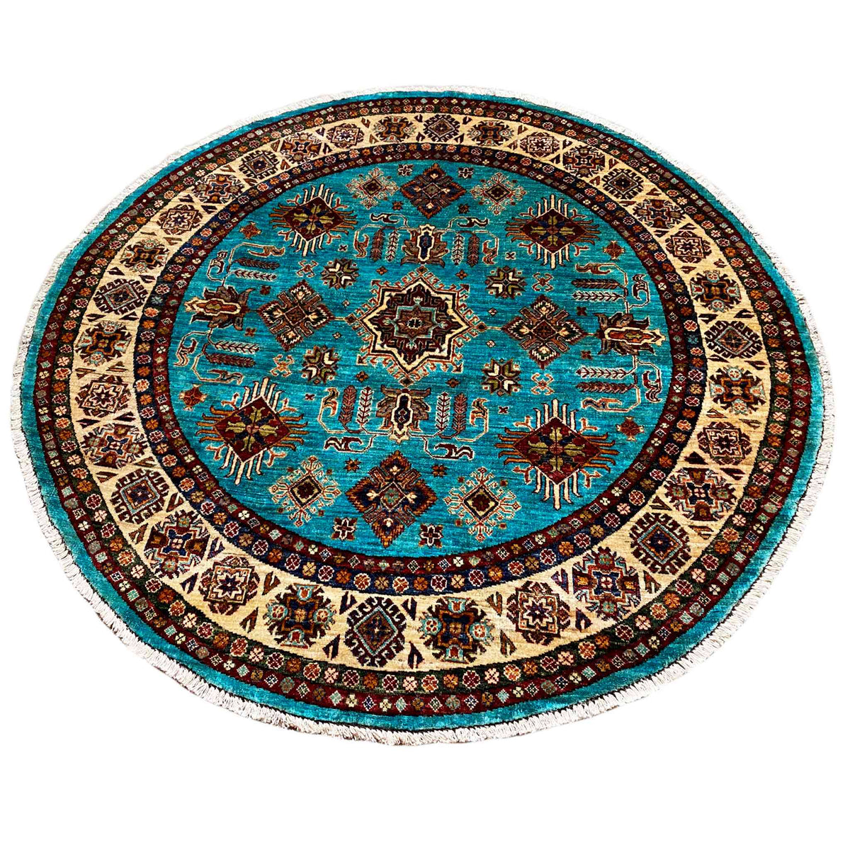 Round turquoise rug with a dark circular pattern and geometric border design