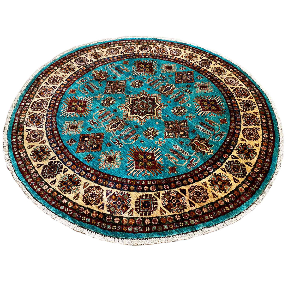 Round turquoise rug with star-shaped ornaments in the center and a dark border