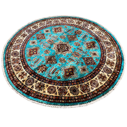 Round turquoise rug with a multicolored ornamental border and central star motif