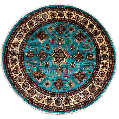 Round turquoise rug with an oriental pattern and beige border