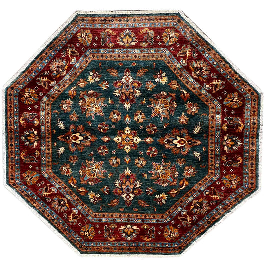Octagonal rug with a floral Oriental pattern in teal, red, and gold