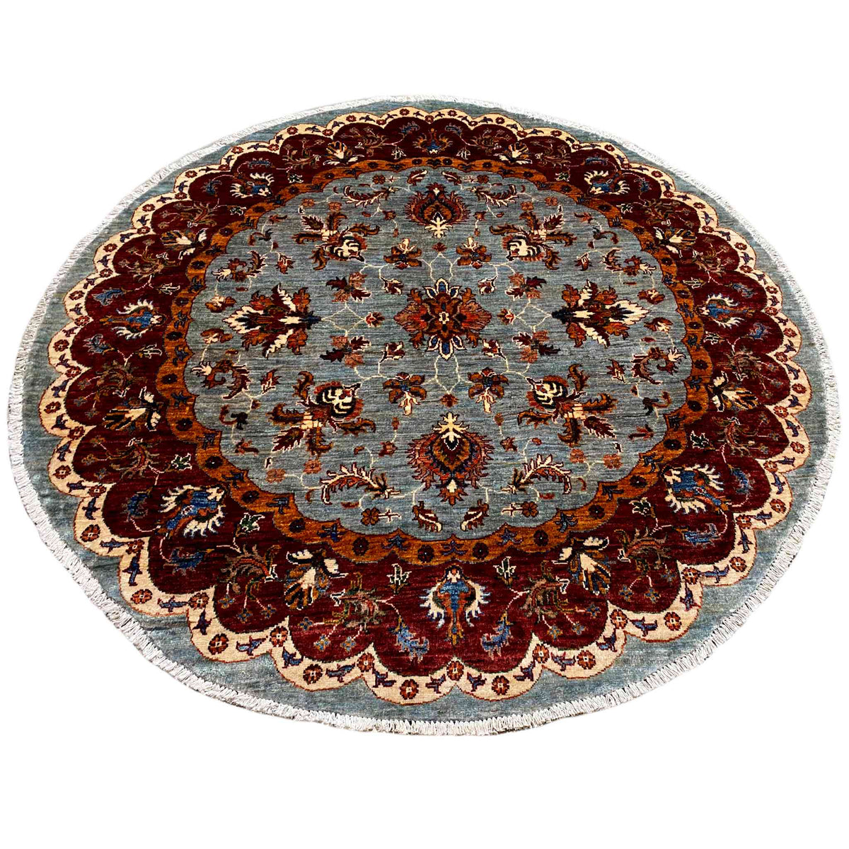 Round Kazak rug (176×175 cm) with a light blue patterned field and a wide red medallion border.