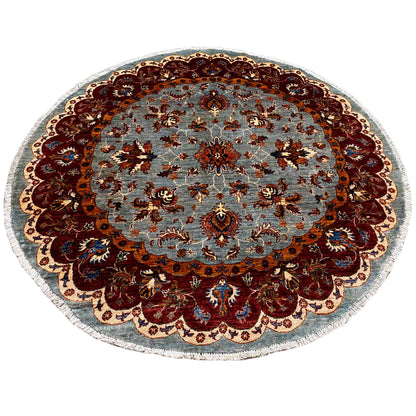 Round Kazak rug (176×175 cm) with a light blue patterned field and a wide red medallion border.