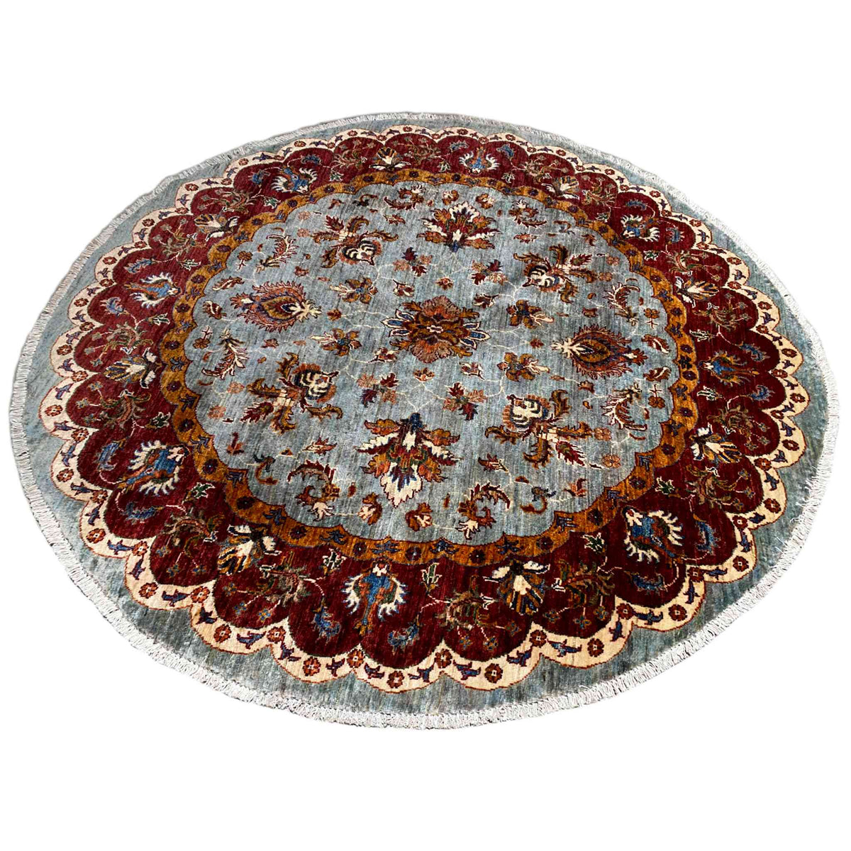 Round Kazakh rug (176×175 cm) with a blue central section and dark red border pattern.