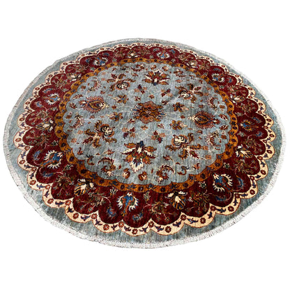 Round Kazakh rug (176×175 cm) with a blue central section and dark red border pattern.