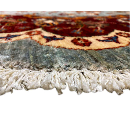 Kazakh rug at the edge with white fringes and a multicolored pattern visible underneath.