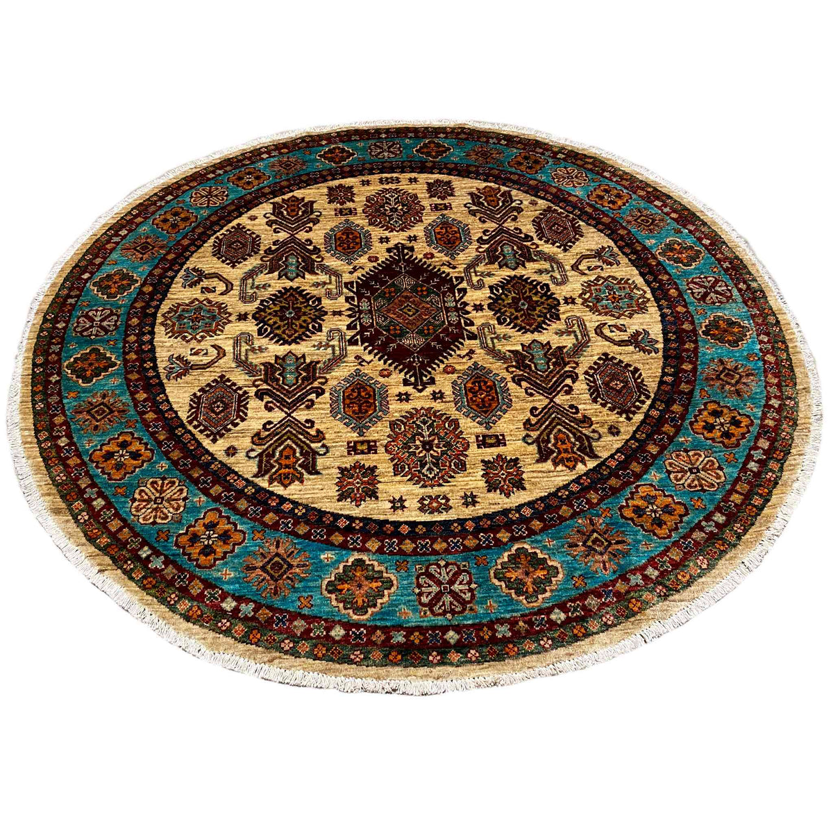 Round rug with an ornamental border in turquoise, cream, and dark brown