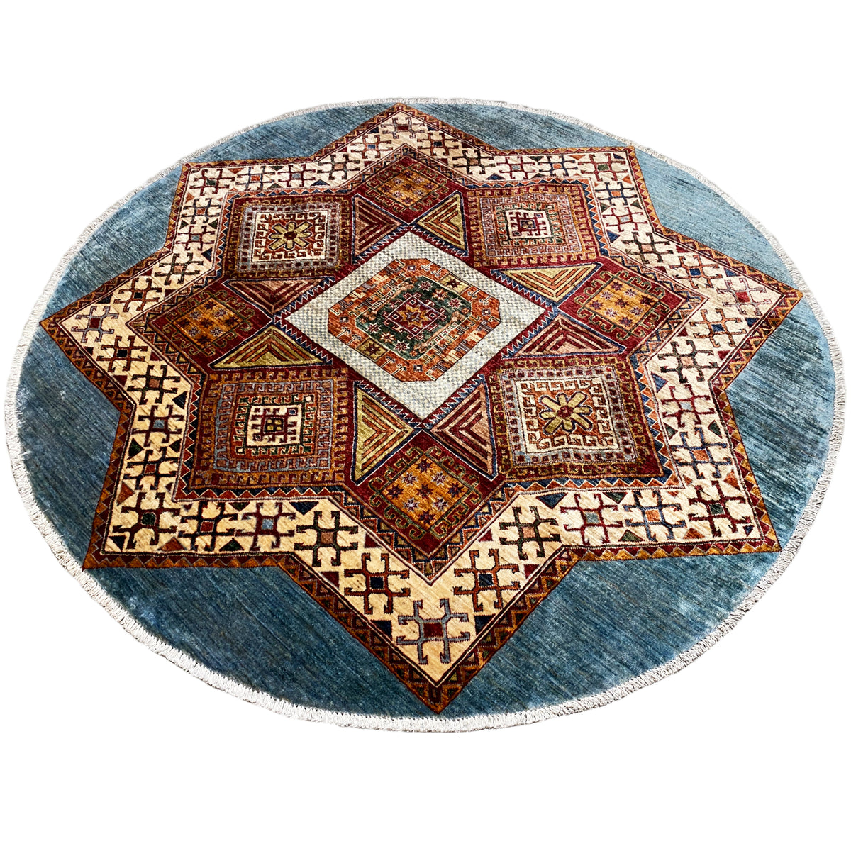 Round Kazakh rug with a centered star, colorful geometric motifs, blue border