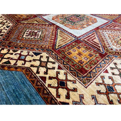 Close-up of Kazak rug: cross and diamond patterns in blue, beige, and red