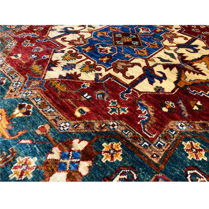 Close-up: multicolored ornamental pattern on a red carpet with a blue center