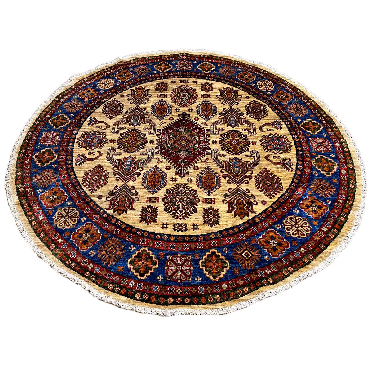 Round rug with beige ornamental design and blue decorative border around the edge