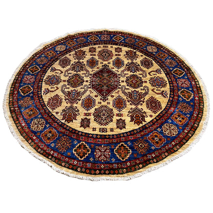 Round rug with beige ornamental design and blue decorative border around the edge