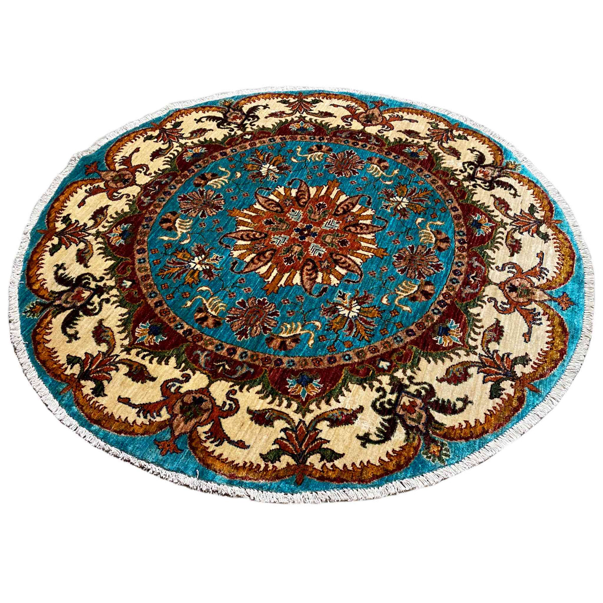 Round Baroque rug with a turquoise central area, brown patterns, and a beige border.