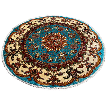 Round Baroque rug with a turquoise central area, brown patterns, and a beige border.