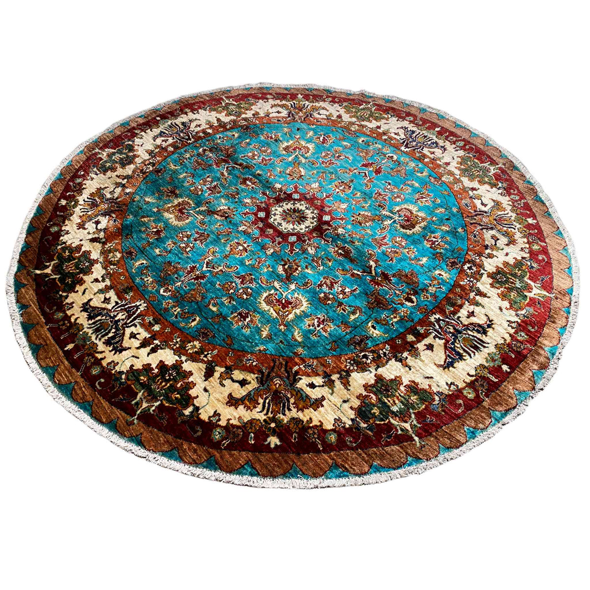 Round rug with a turquoise medallion, beige ornaments, and a dark border