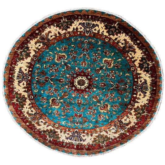 Round rug with a turquoise and beige ornamental pattern and a wide bordered edge