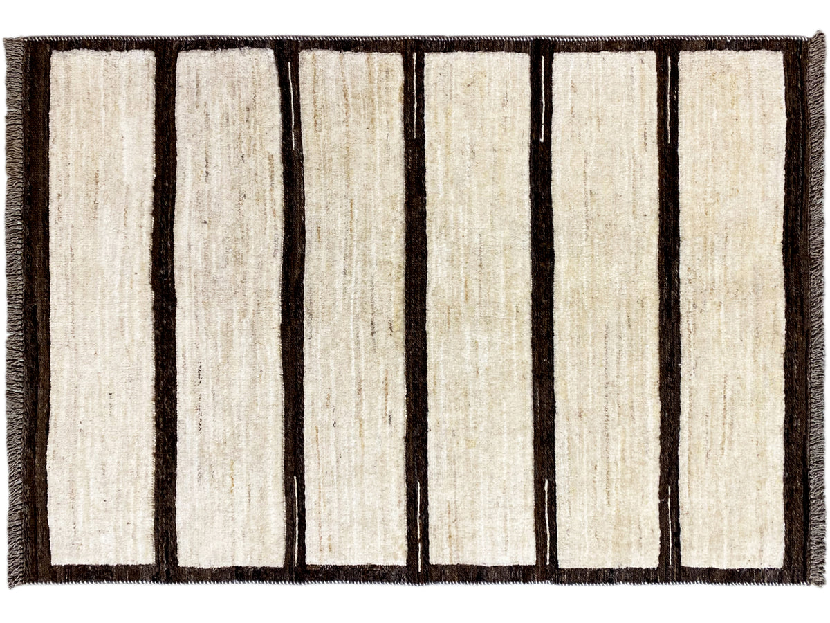 Rectangular kilim rug with vertical beige stripes and a dark border, fringes on the sides.