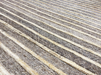 Detailansicht: gewebte Streifen in Grau, Beige und Gelb, strukturierte Faseroberfläche