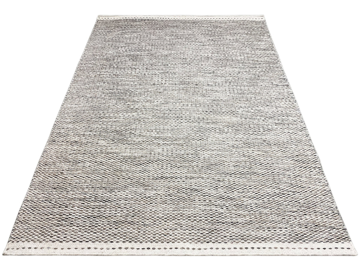 Rectangular light gray flat-woven kilim rug with dot pattern and bound edges