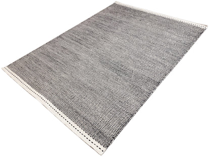 Kelim rug, dark gray, spread diagonally, with a light-edged border