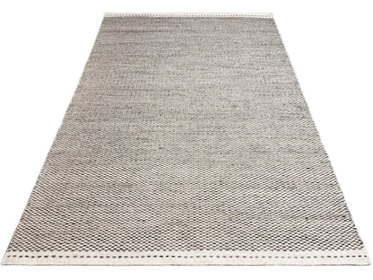 Kilim rug in silver, spread out over a large area, fine linear woven pattern, edge stitching