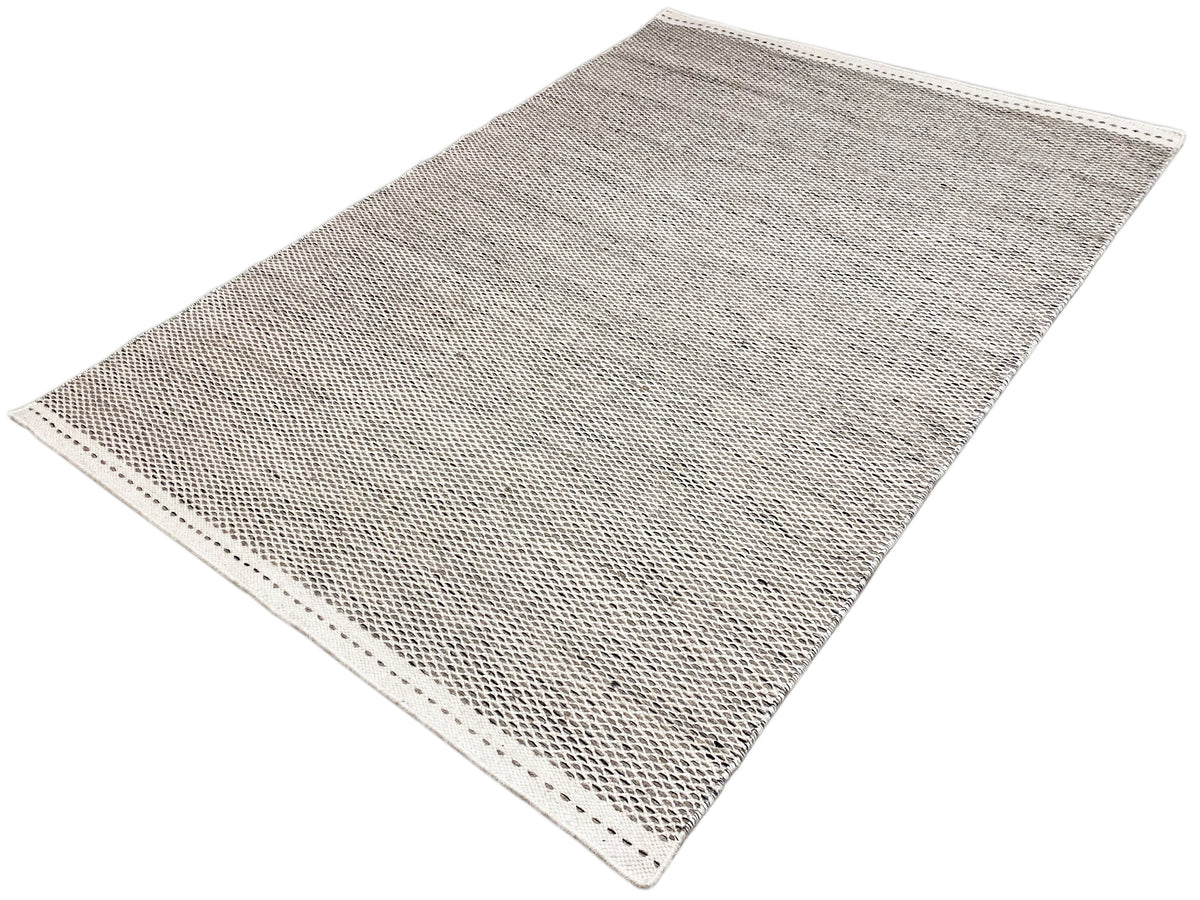 Silver kilim rug, slightly angled, fine woven pattern, bound edge