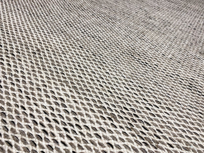 Silver kilim rug, close-up of the woven texture with an even grid pattern
