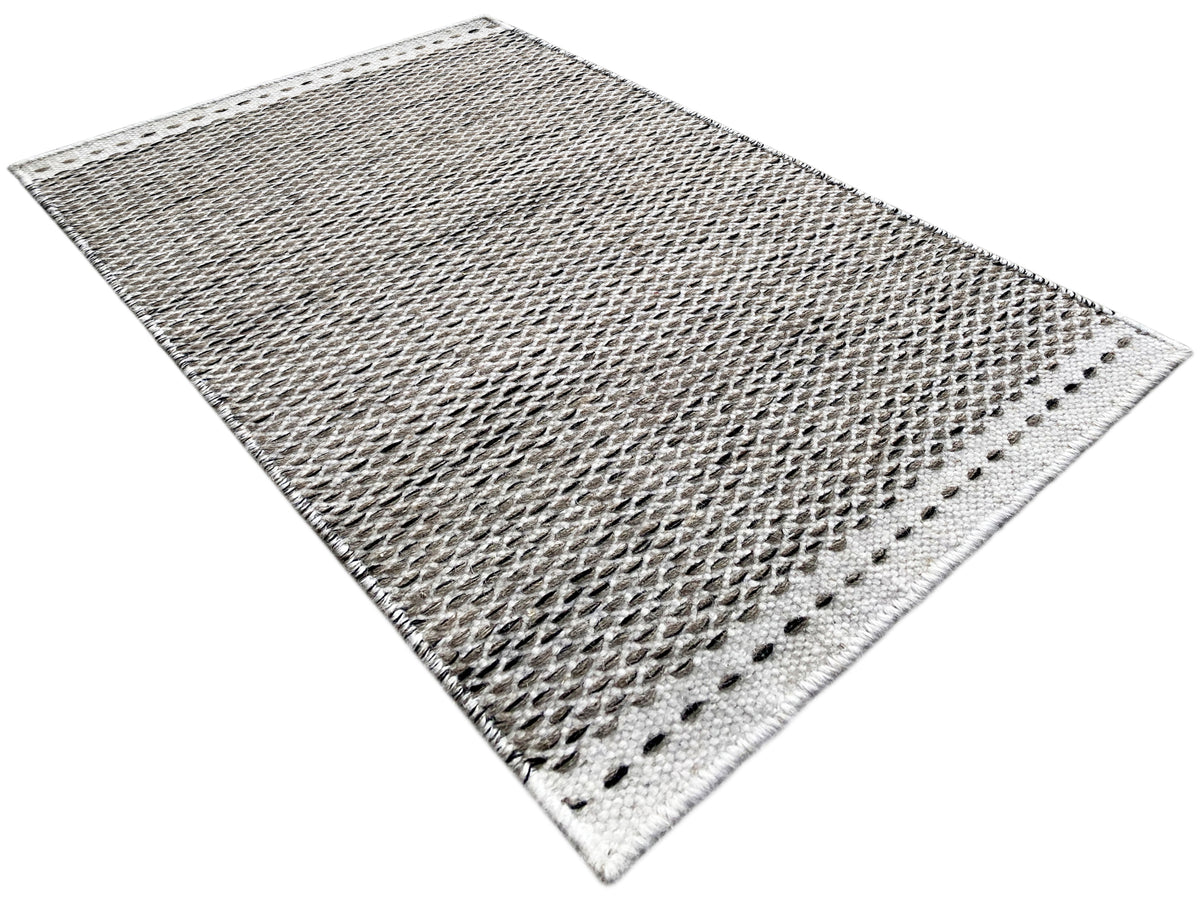 Gray kilim rug 60x90 cm, lying diagonally, uniform kilim weave pattern