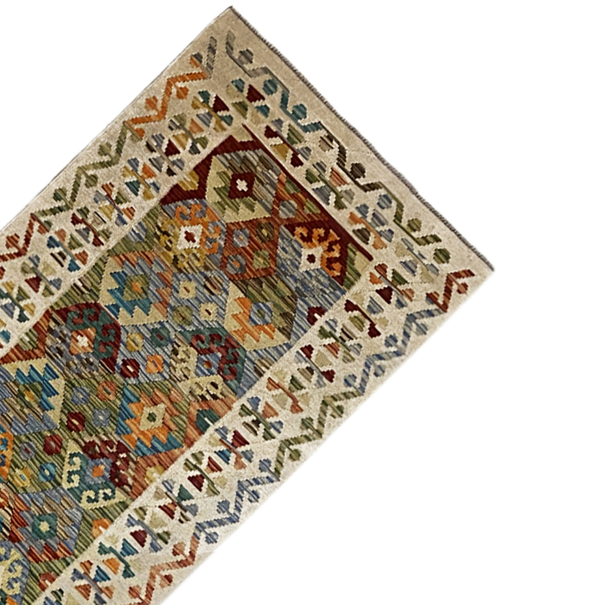 Kilim runner corner with a triangular border pattern and colorful inner motifs