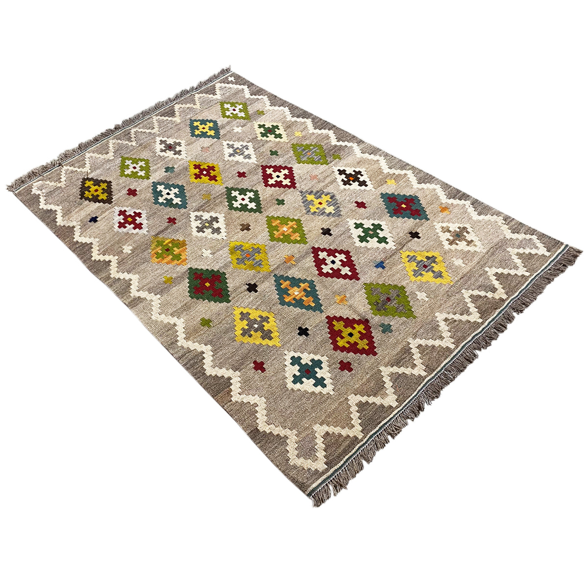Kilim rug with colorful cross and diamond patterns, diagonal view, zigzag edges