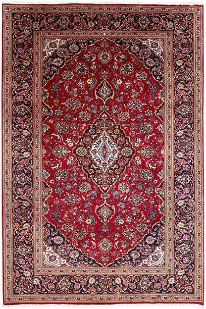 Rug with a red central field, white and beige medallions, and a multicolored border stripe